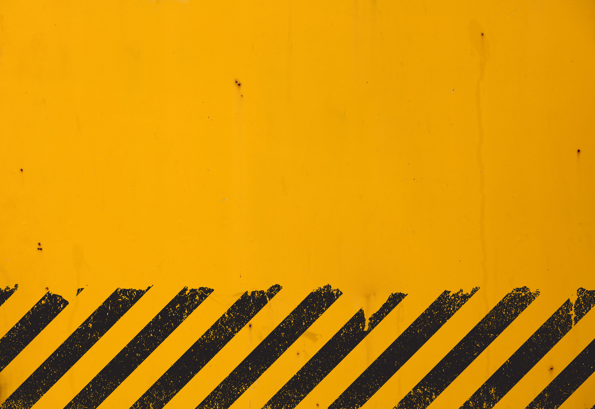 Yellow Background with Black Grunge Hazard Sign